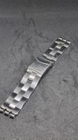 Bracelet montre Swatch acier boucle deployante. 18mm