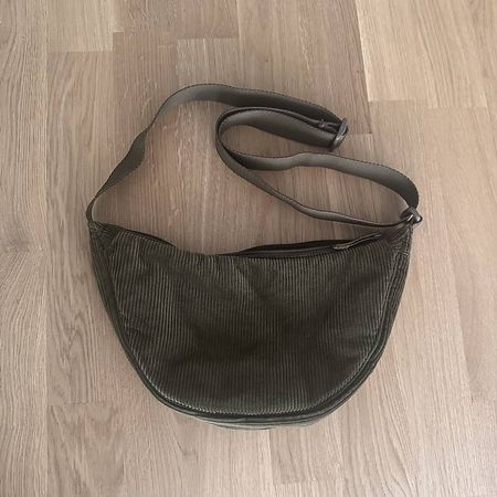 Uniqlo runde Umgängetasche
