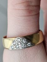 Goldring 18 Karat (750) mit 7 Steinen/ 6 gr.
