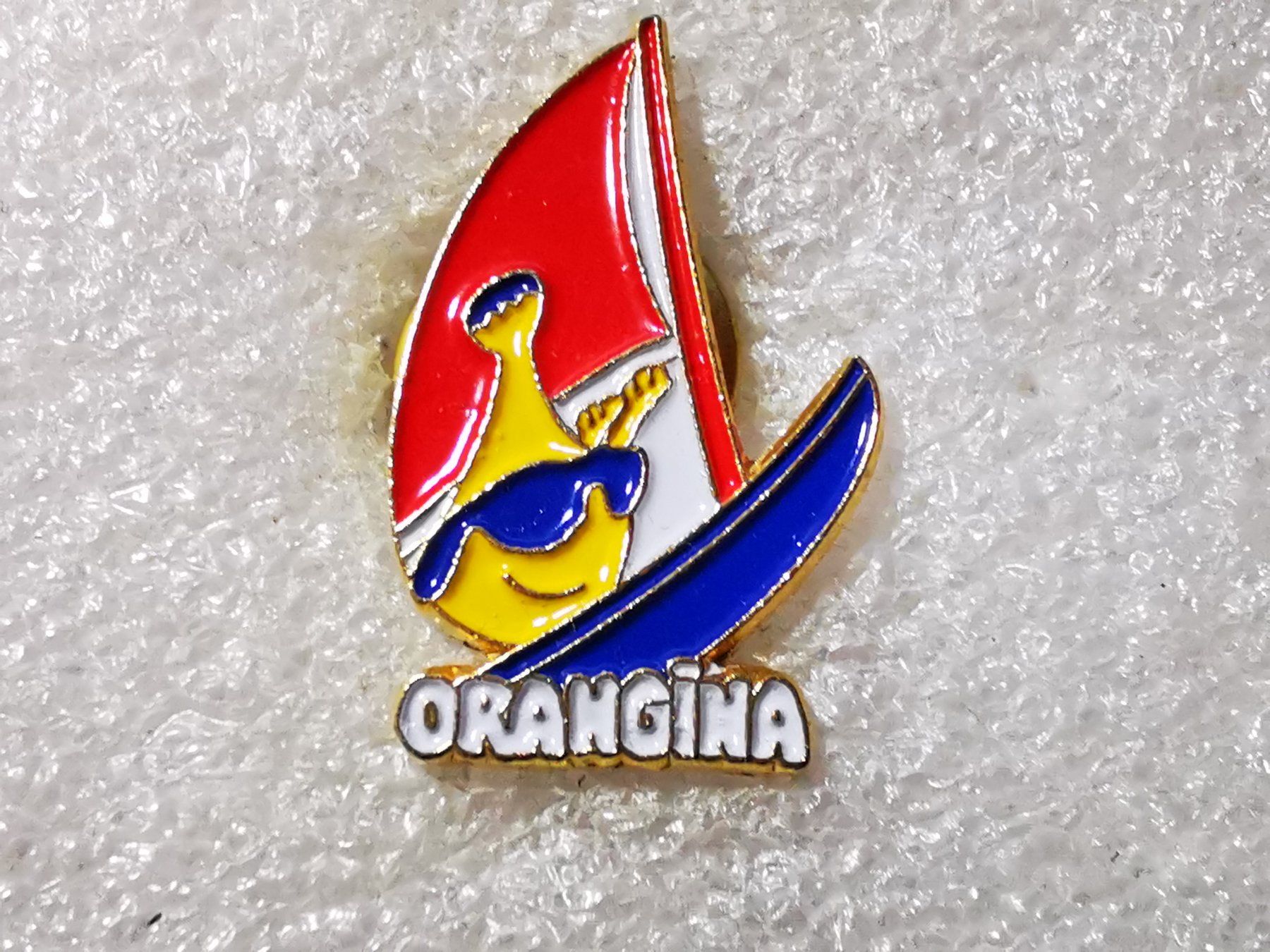 Placchette & Badge: Ansteckpin 65: Orangina – Usato da Oppligen venduto da Pin-Fall-Shop