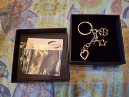 Porte-clé en métal avec pendentifs marque Unoaerre