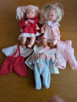 2 kleine Puppen mit Kleidchen