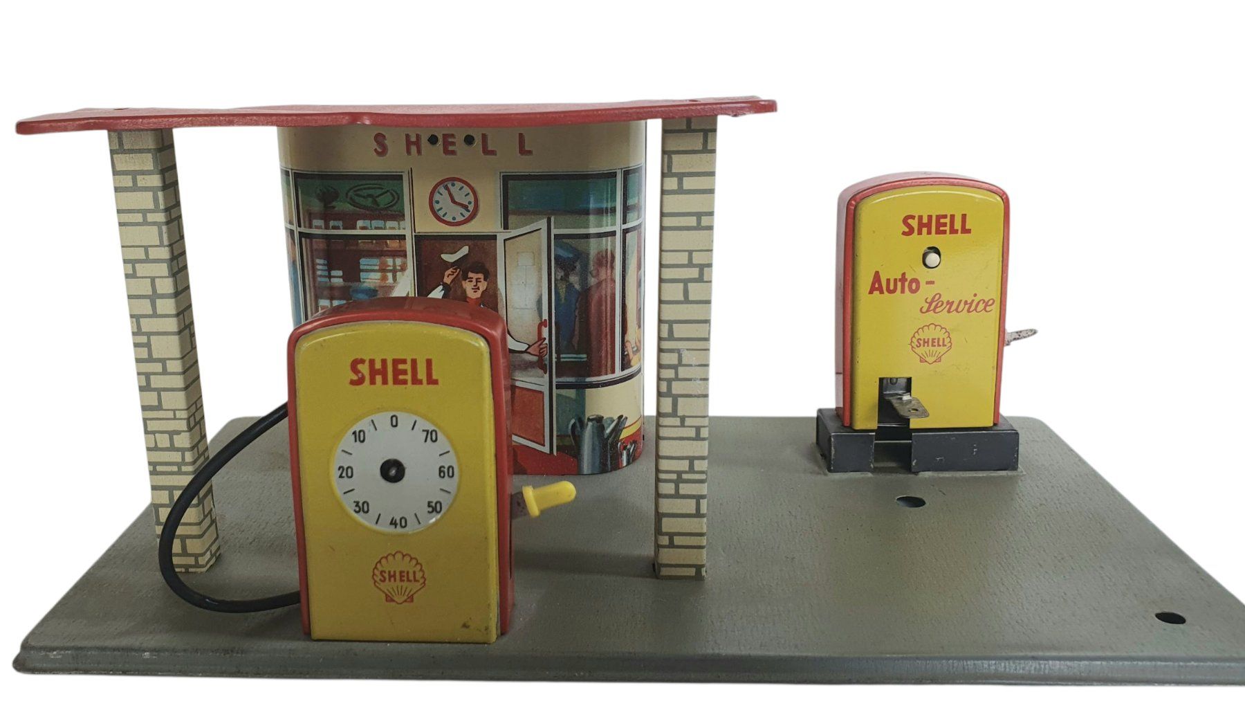 Spielzeuge: alte Blech Tankstelle – Gebraucht aus Flawil von JaguarXJSHE