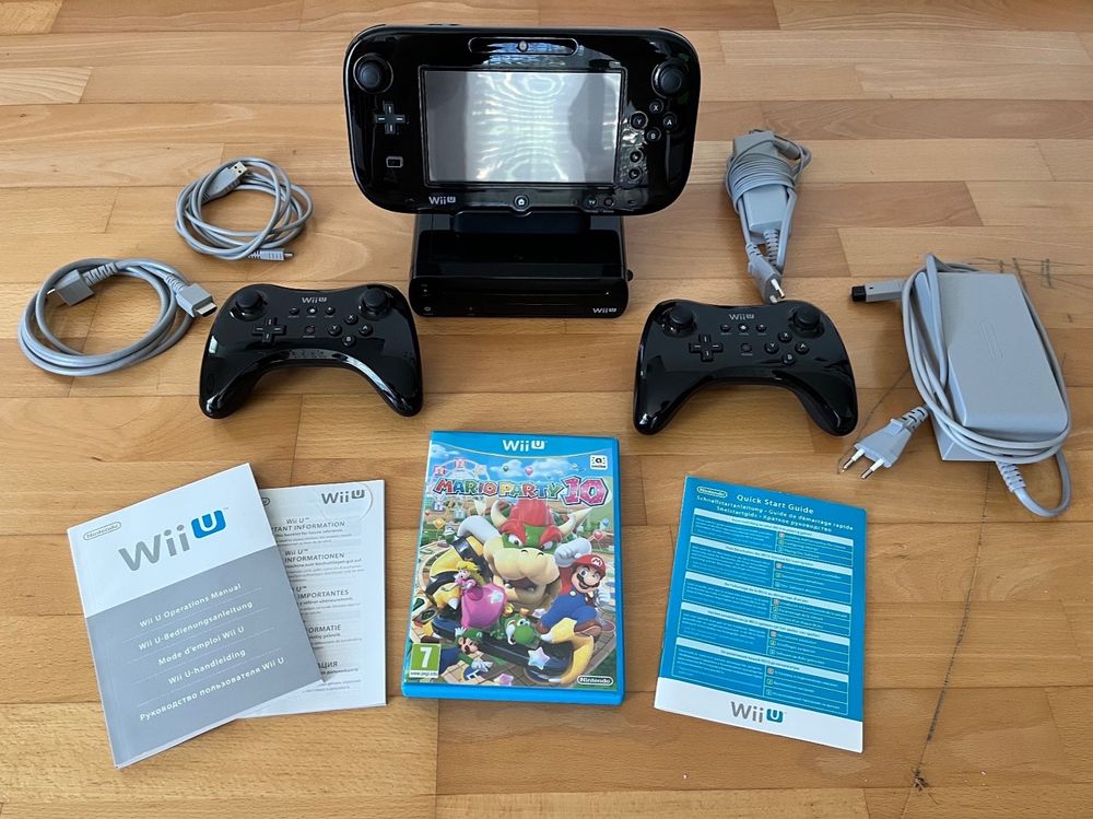 Nintendo Wii U inkl. zwei Controllern & Game Kaufen auf Ricardo
