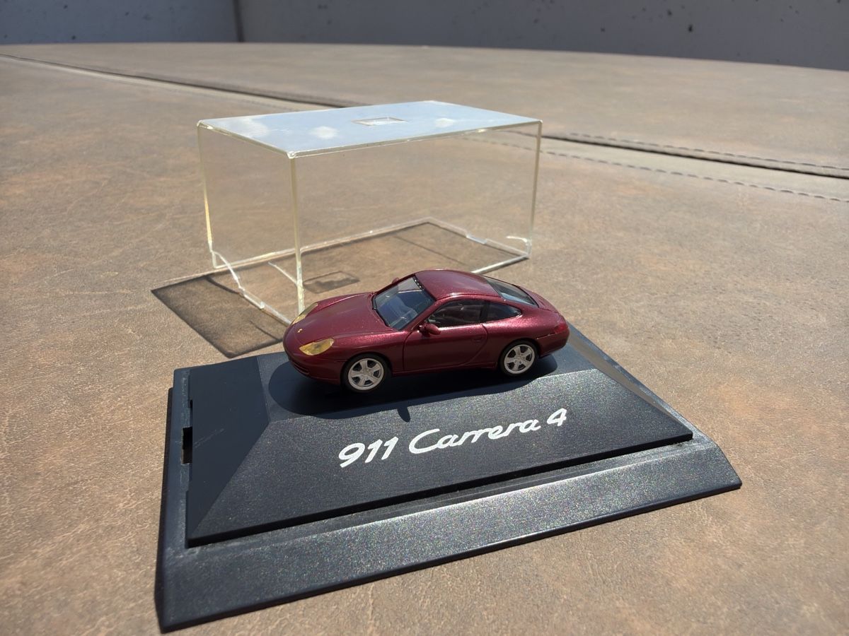 Porsche Modellini d'auto: Porsche 996 Carrera 4 - 1/87 – Usato da Wolfwil venduto da Rolex1