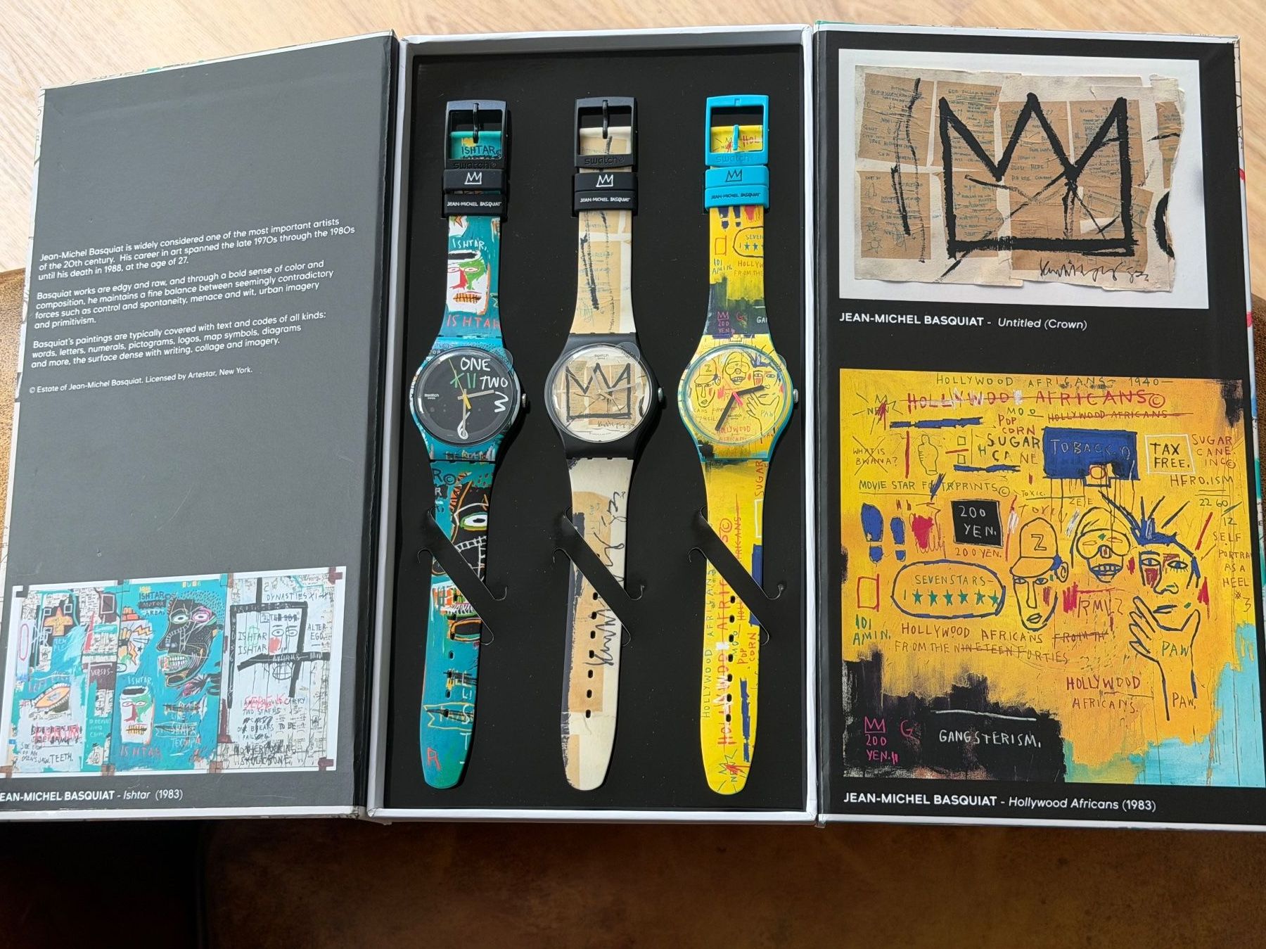 Swatch Orologi: Coffret Swatch X Jean-Michel Basquiat – Nuovo e nell'imballaggio originale da La Chaux-de-Fonds venduto da JUVAL_Horlogerie