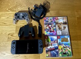 Nintendo Switch Konsole mit Zubehör und 4 Spielen