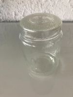 Antikes Honig-Glas mit Biene auf dem Glasdeckel
