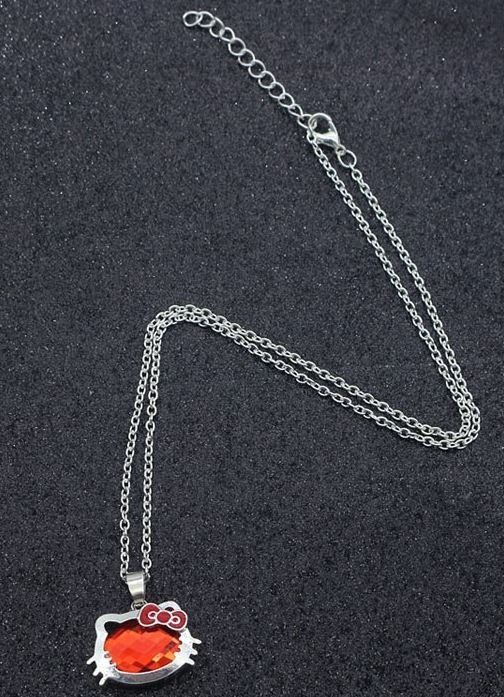 Catenine: Hello Kitty: 1 collier pierre rouge SOLDES – Nuovo e nell'imballaggio originale da Lutry venduto da kylab7
