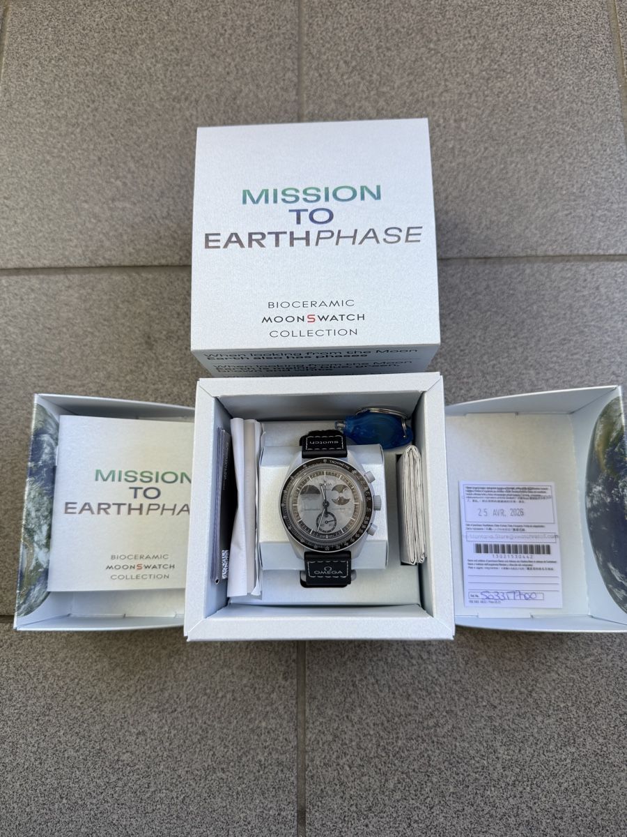 Swatch Uhren: Swatch MISSION EARTHPHASE – Neu und originalverpackt aus Sierre von val_tc8d