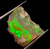 Edelstein L-2027 – Äthiopischer Feueropal rau 11X8X7mm -3,15
