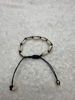 Bracelet coquillages noir ajustabl neuf