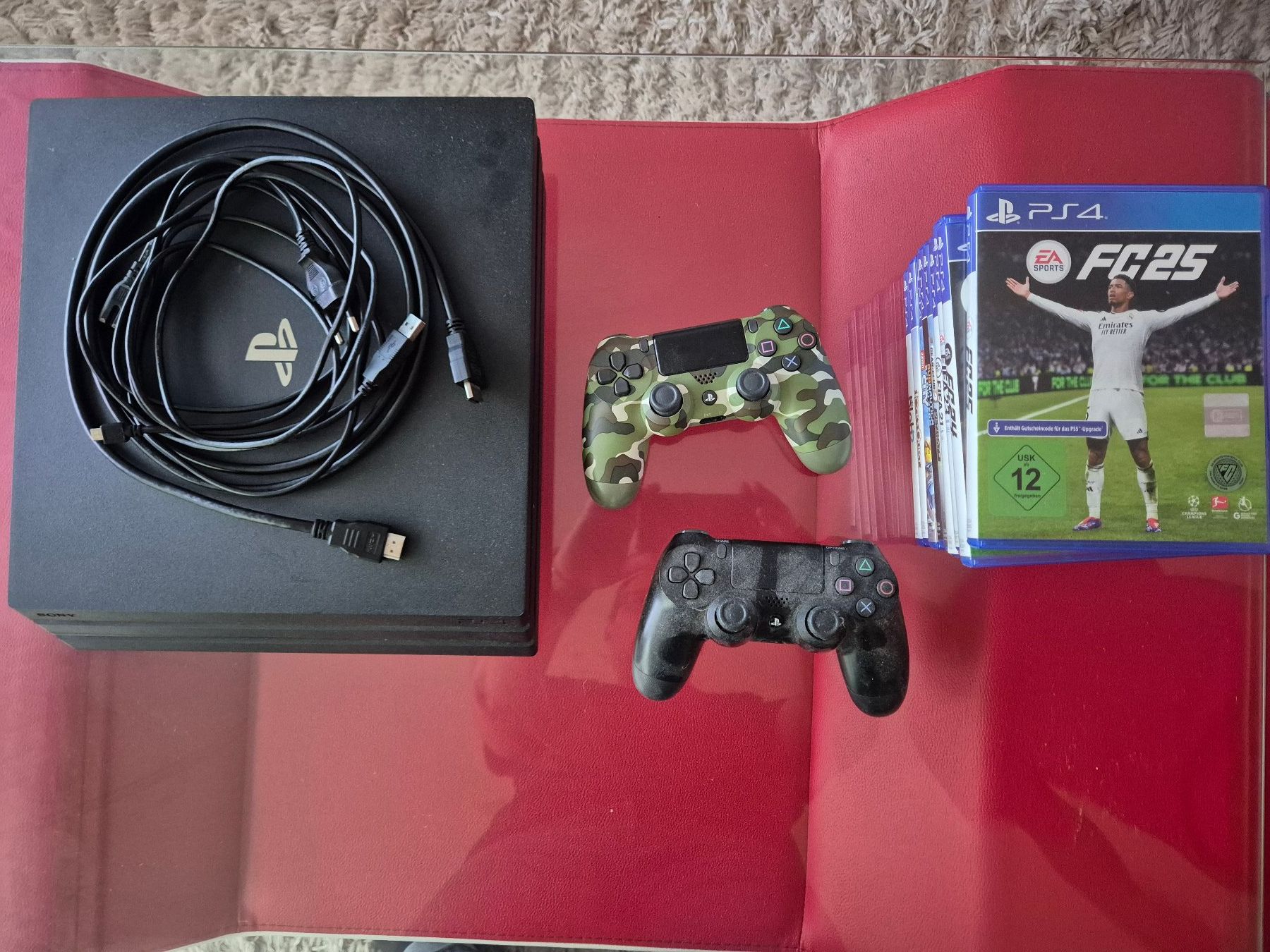 Sony Konsolen: PS4 Pro + 2 Controller + 9 Spiele – Gebraucht aus Dättwil AG von dida123