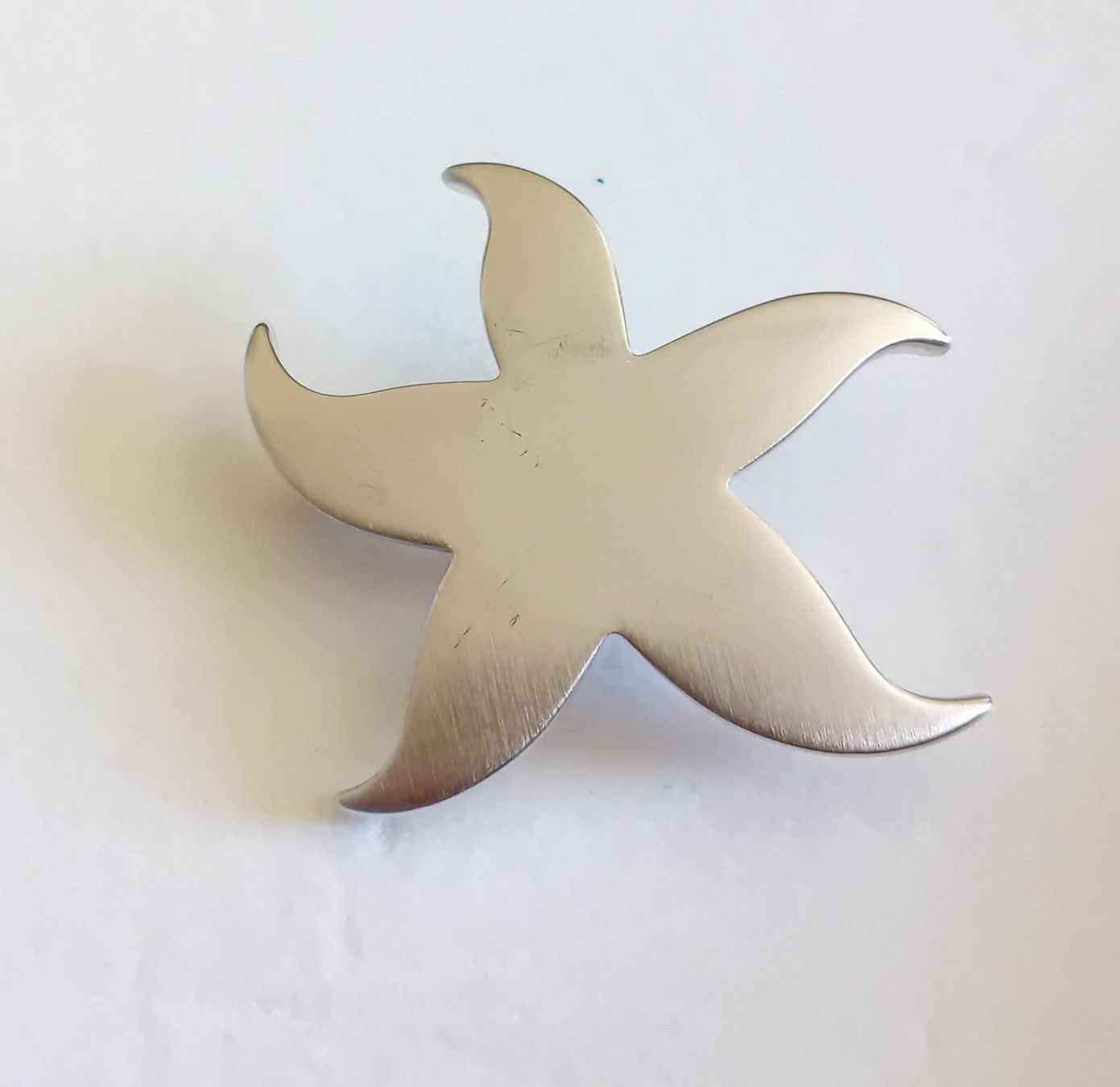 Pierre Lang Catenine: Collier / broche étoile argenté Pierre Lang - acier – Usato da Neuchatel venduto da Vlenoble 1