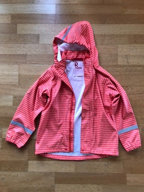 Reima Giacche: Regenjacke Reima 122 orange – Usato da Zürich venduto da bel5