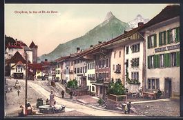 AK Gruyéres, la rue et Dt. de Broc