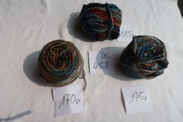 3 angef.Knäuel Wolle  460gr.  (458)