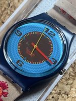 Damen Uhr Swatch Hellblau-gesticktes Armband