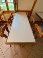 Esstisch mit sechs Stühlen