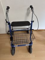 Rollator deambulatore blu con sedile e cestino usato