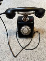 Altes Telefon mit Wählscheibe schwarz guter Zustand
