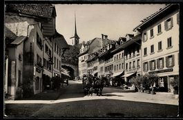 AK Burgdorf, Metzgergasse mit Geschäften und Pferdekutsche