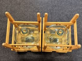 2x Schwilch 25L Mostflasche im Holzgestell inkl. Original-Ve