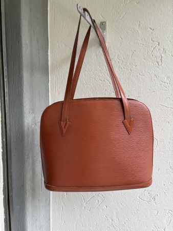 Louis Vuitton Lussac in top Zustand