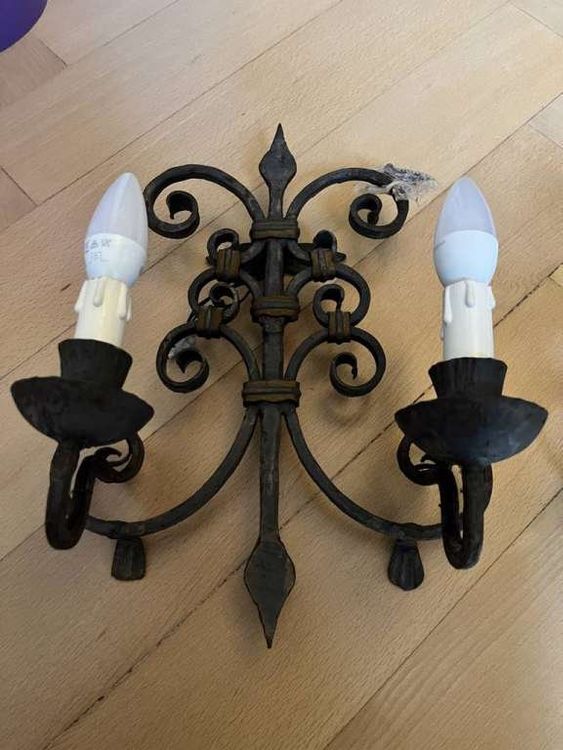 Bras de lumière baroques en fer forgé doré XVIII siècle