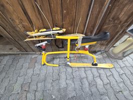 Snowbike Brenter gelb mit Gebrauchsspuren 