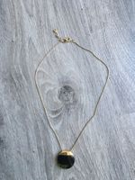 Skagen - Goldene Halskette mit schwarzem Stein Anhänger