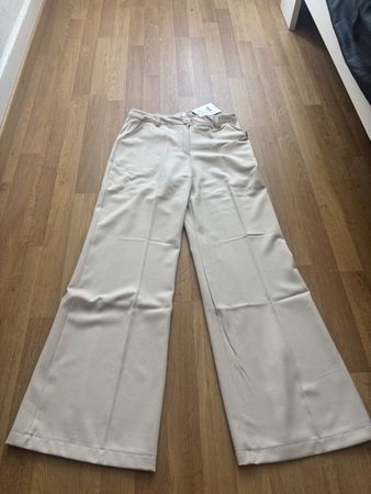 Pantalon relax beige taille M neuf