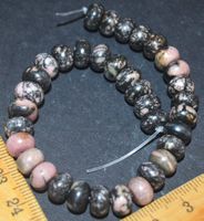 Stein Perlen Strang B-1210 – Schwarze Spitze Rhodonit Rondel