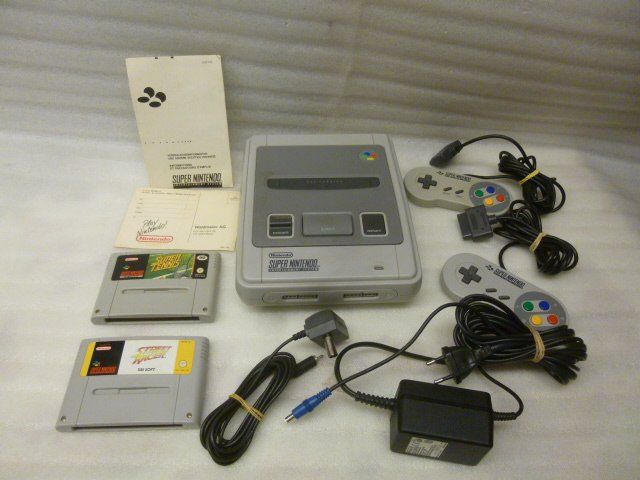 Nintendo Konsolen: Nintendo SNES Konsole + Kabel + 2 Spiel – Gebraucht aus Pambio Noranco von Pol69
