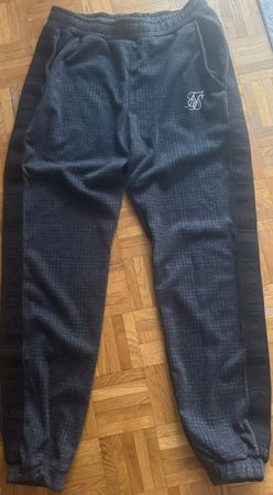 Pantalon Sik Silk gris carreaux taille S bon etat neuf