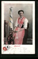 Frau in Appenzeller Tracht am Spinnrad, 