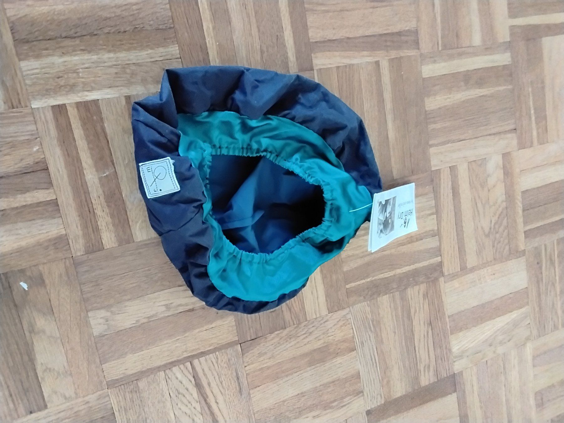 Caschi: Oldschool Regenschutzhabe Helm Dry Riese & Müller – Nuovo e nell'imballaggio originale da Lohn-Ammannsegg venduto da analogis 5