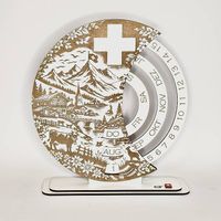 Drehbarer Holzkalender mit Schweizer Alpenmotiv
