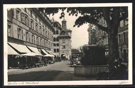 Genf, Strassenpartie mit Brunnen und Tor