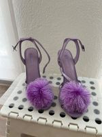 Lila Pumps mit Pompon - ungetragen