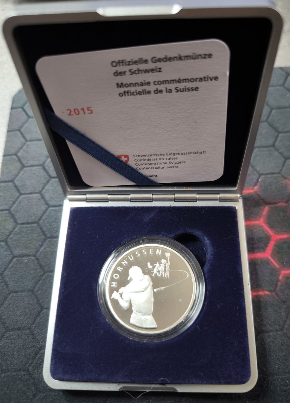 Tutti le monete: 20 Franken 2015 Silber PP Hornussen Box – Usato da Nyon venduto da AlexKey71