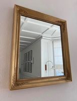 Antiker goldener Spiegel