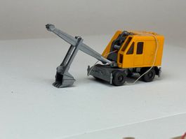 GB3- Wiking Krupp Schaufelbagger mit Rädern chromgelb