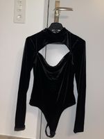 Edler Bodysuit mit Rückenausschnitt und Samtoptik