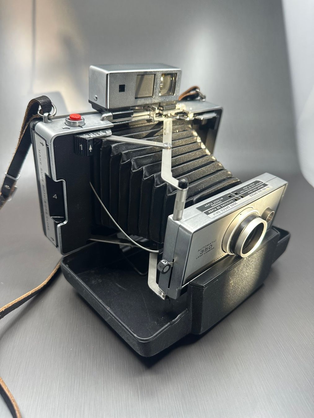 Polaroid Fotocamera: Polaroid Automatic 350, Schnellbildkamera, inkl. Koffer – Usato da Arisdorf venduto da Liquidus 2