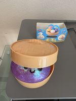 Squeezy Dumpling Spielzeug lila mit Korb neuwertig