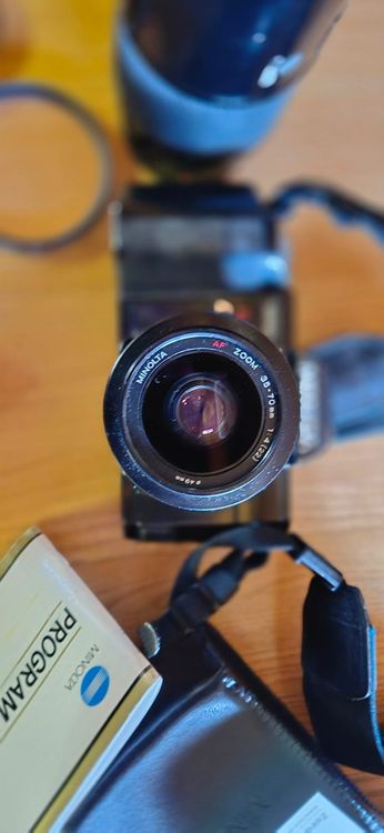 Minolta Fotocamera: Minolta 7000 Reflex Autofocus mit Zubehör und Objektiven – Usato da Intragna venduto da Digger3 5