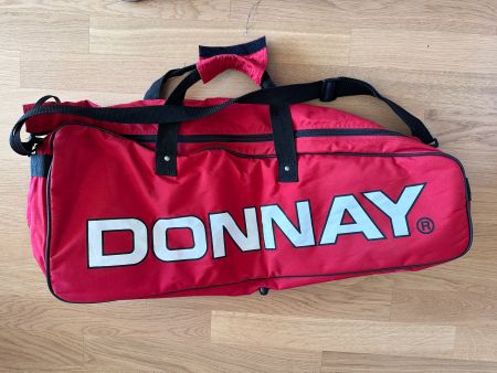Sac de tennis Donnay rouge vintage en excellent état.