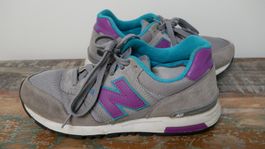 New Balance Sneaker WL565 grau lila blau