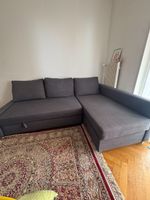 Canapé d'angle gris convertible en bon état général